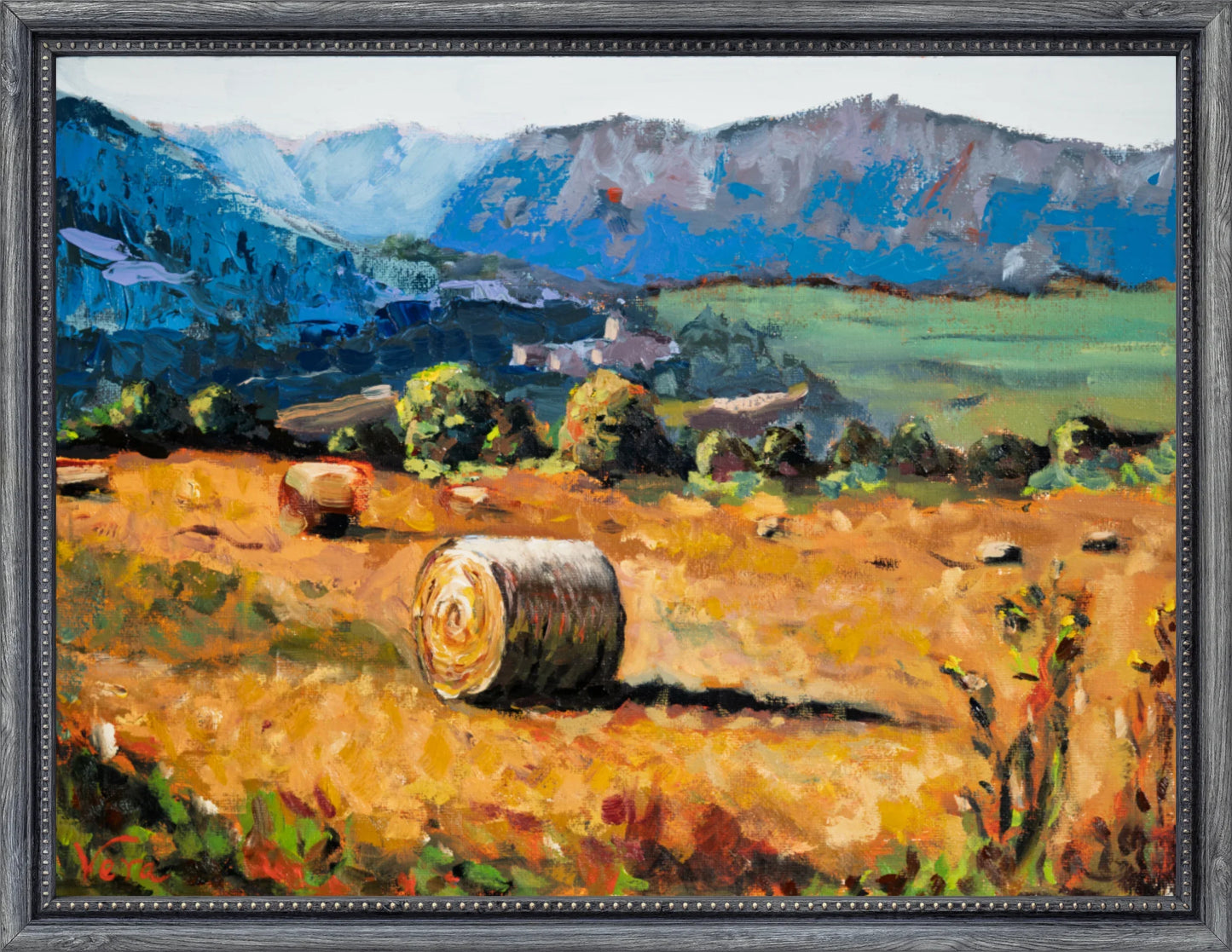 Oil painting of a sunlit hayfield with bales and distant blue mountains, Vera Studio art