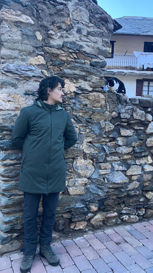 Javier looking at one of the street cats of Alp